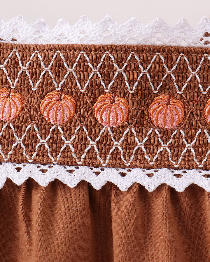 Brown smocked yoke with pumpkin embroidery and white lace trim
