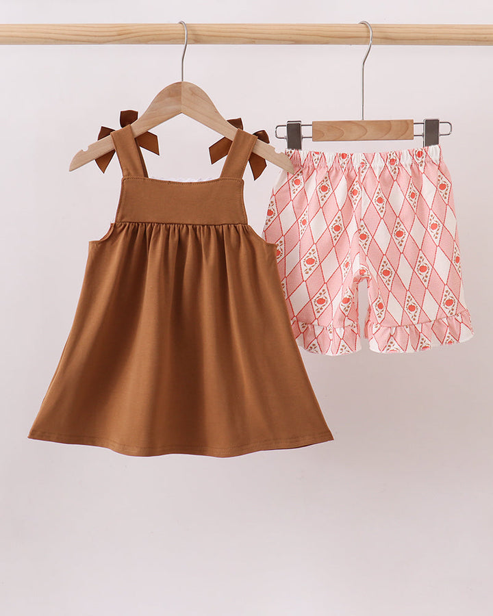 Brown sleeveless bow dress paired with red diamond pumpkin smocked lace shorts