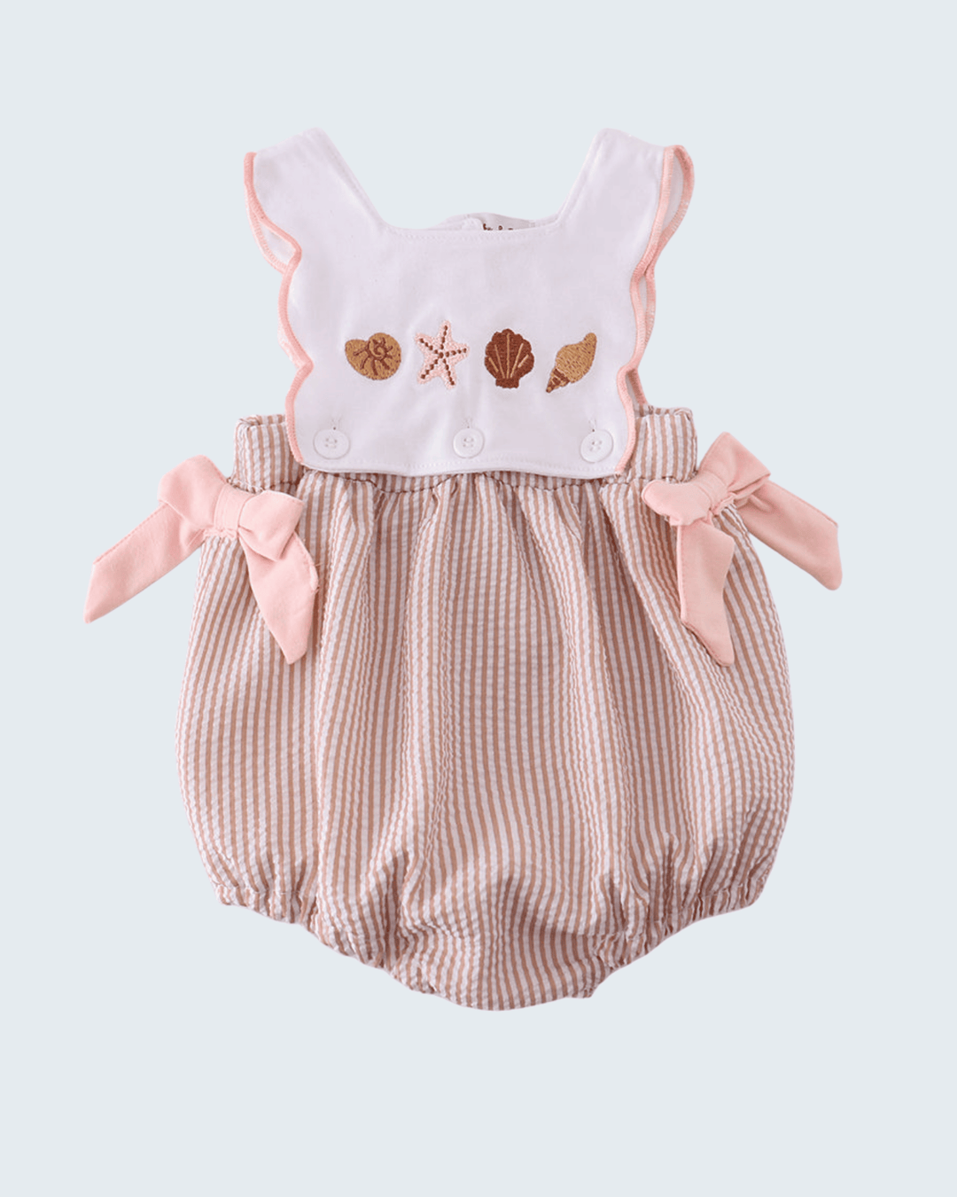 Baby romper with embroidery design on a light gray background