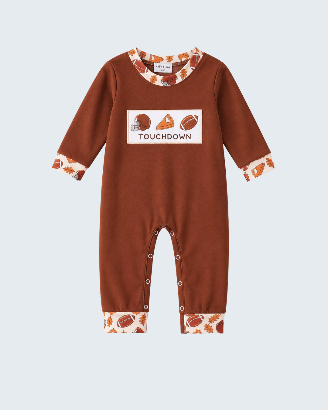 Brown baby romper with football touchdown patch, long sleeves, snap legs