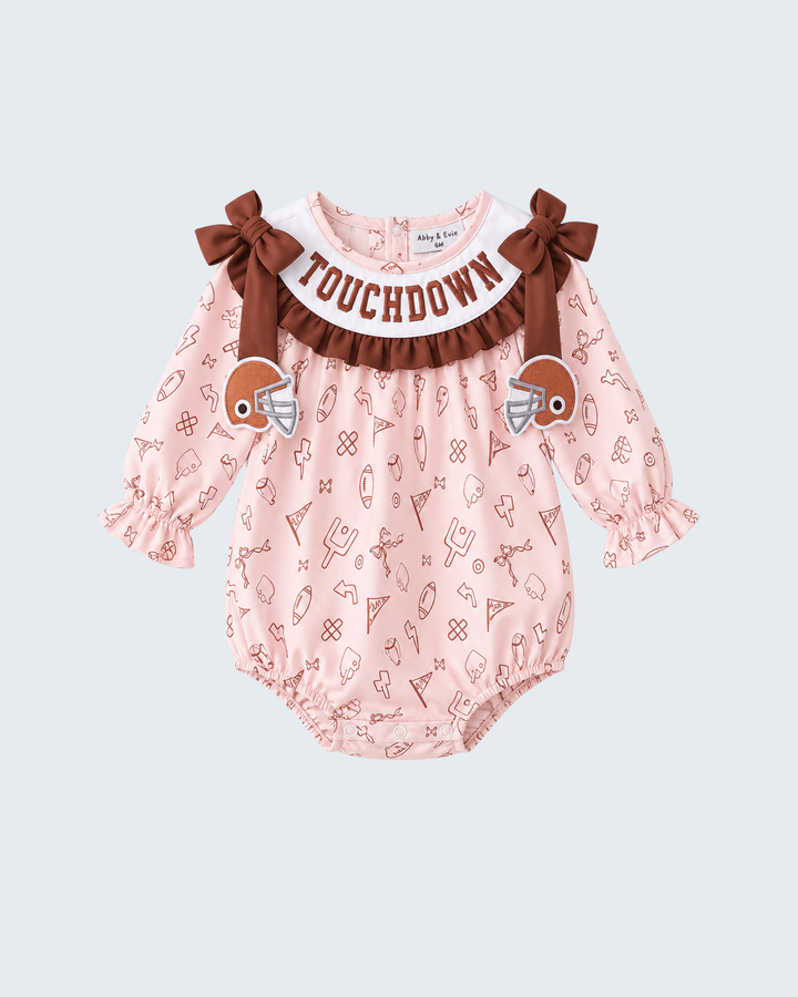 Pink embroidered bubble romper with brown ruffle collar and FOOTBALL text