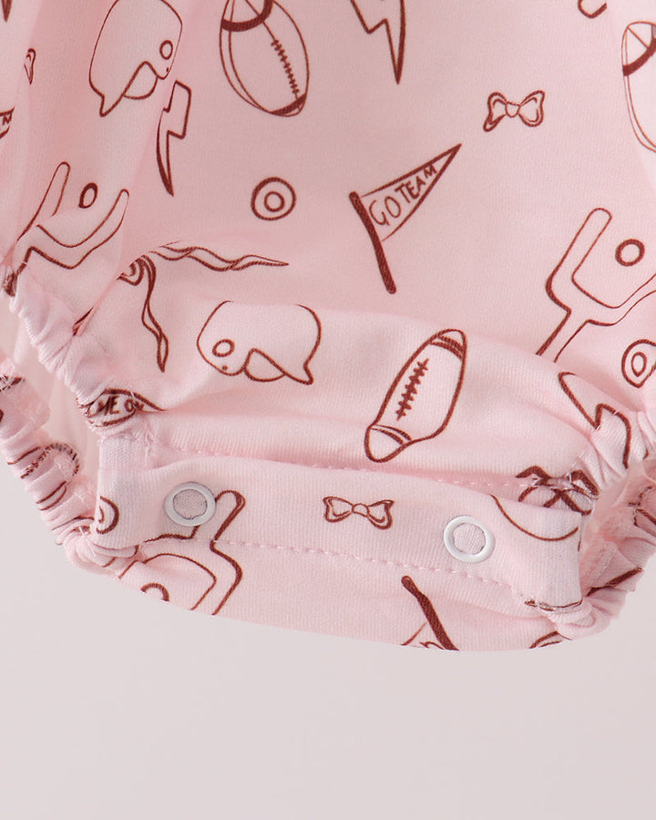 Toddler bubble romper hem with gathered ruffle and sports icons pattern