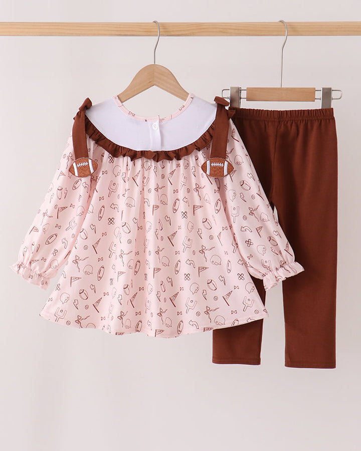 Football-themed ruffle top and dark brown pants set, long sleeves, hanging