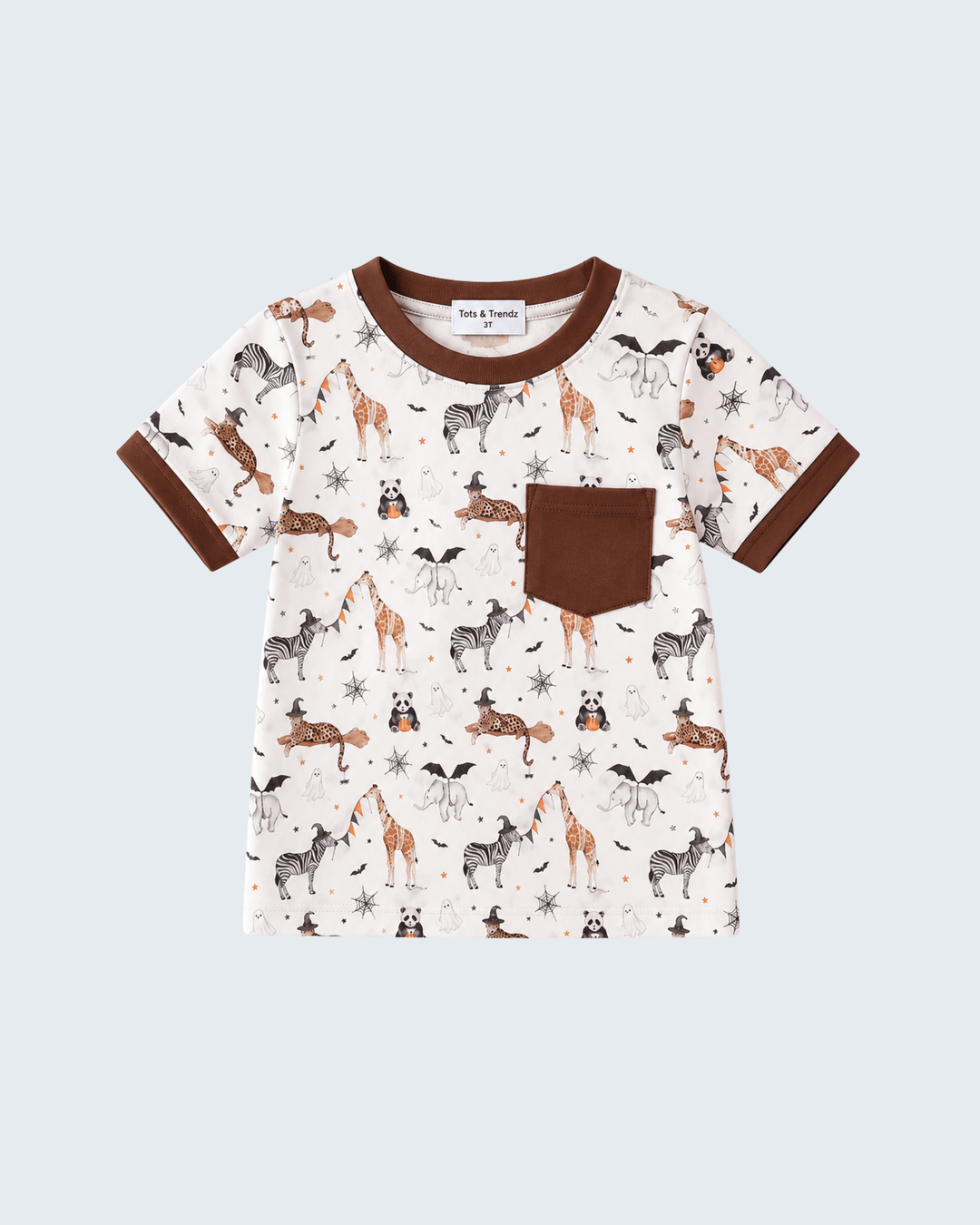 A short-sleeve baby t-shirt with an all-over safari animal print on a cream background, featuring brown ribbed collar, cuffs, and a matching brown chest pocket. The shirt is displayed flat against a light gray background.