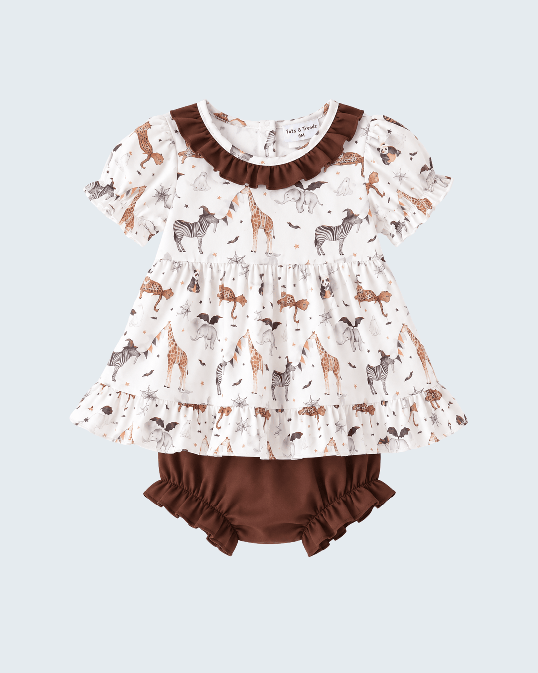 Baby girl's two-piece romper set featuring a short-sleeve cream dress with an animal print and brown ruffle trim, paired with matching brown ruffled bloomers, shown on a light gray background.