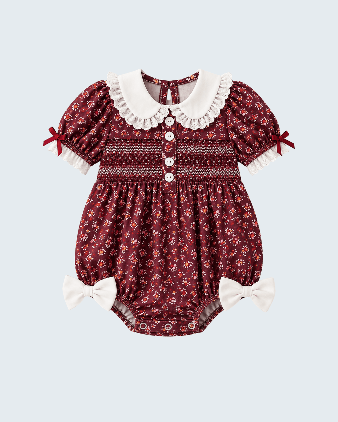 Burgundy floral smocked bubble romper with white Peter Pan collar, button front, bows