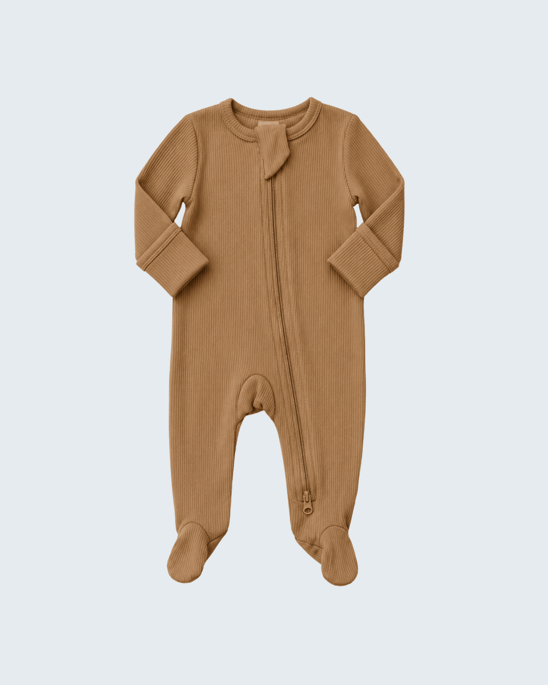 A baby footed sleeper in a warm camel brown color, featuring a long-sleeve ribbed knit design and a front zipper, shown against a light gray background.