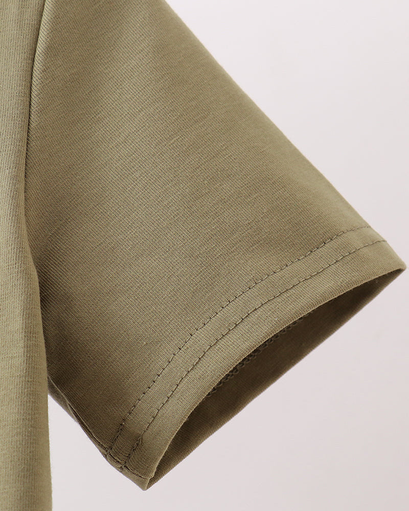 Olive button-down shirt sleeve cuff with stitched hem