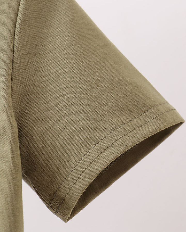 Olive button-down shirt sleeve cuff with stitched hem