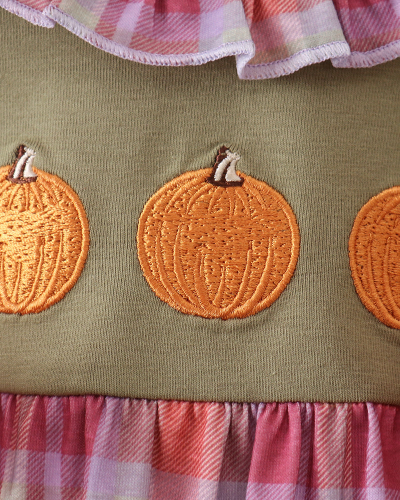Olive green romper with embroidered orange pumpkins and plaid skirt border