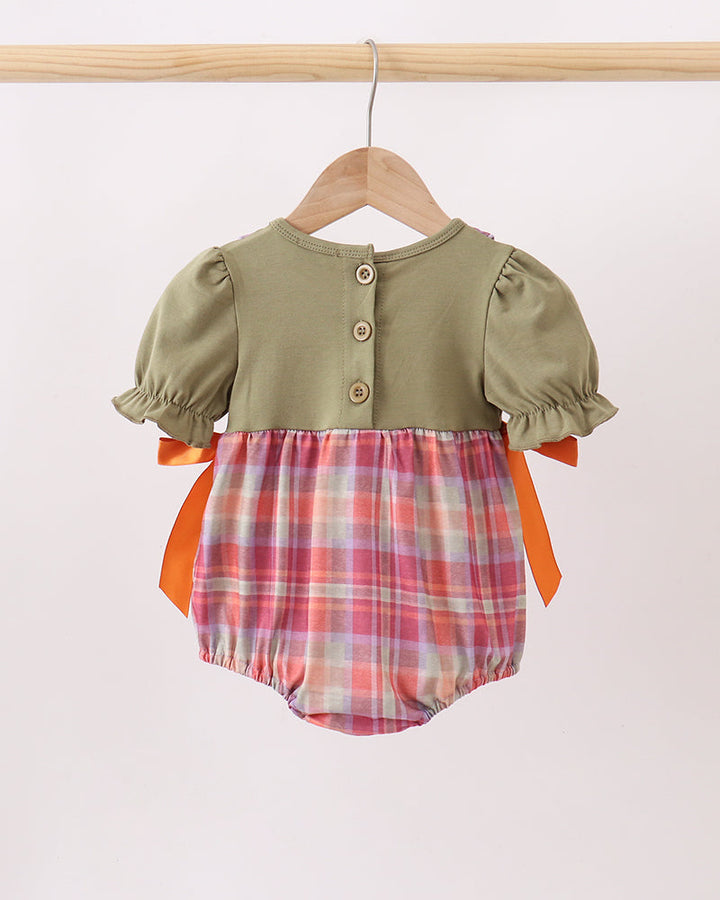 Kids plaid bubble romper on hanger with olive top and orange bow ties