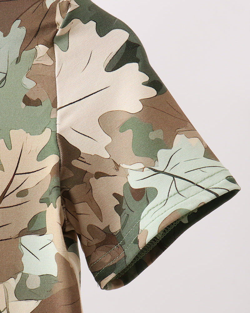 Camouflage-patterned fabric with leaf design on a white background