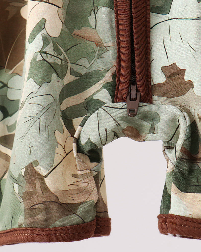 Camouflage-patterned romper with a brown zipper on a white background