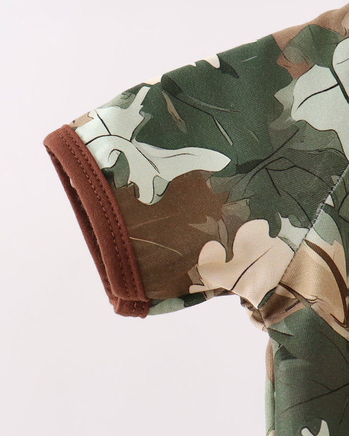 Camouflage-patterned sleeve on a light background