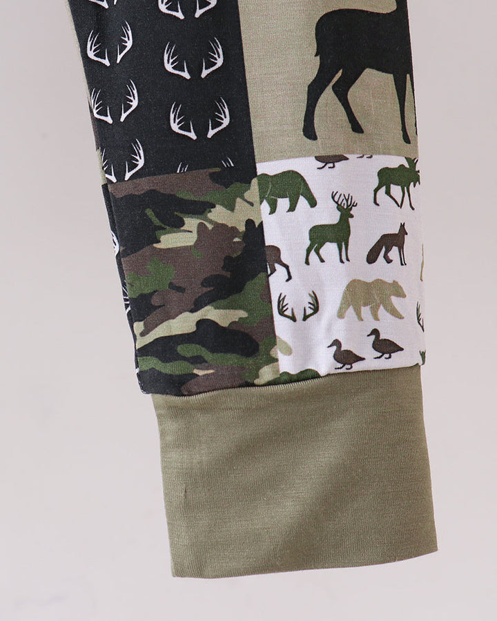 Kids pants with olive cuff hem and mixed deer, animal, and camo print panels