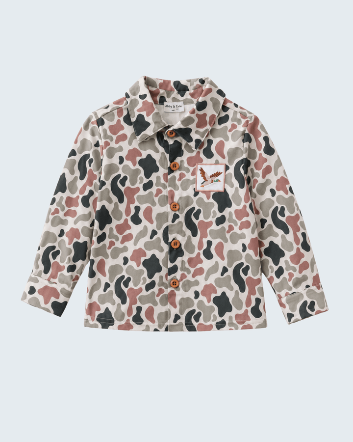 Camouflage-patterned shirt on a light gray background