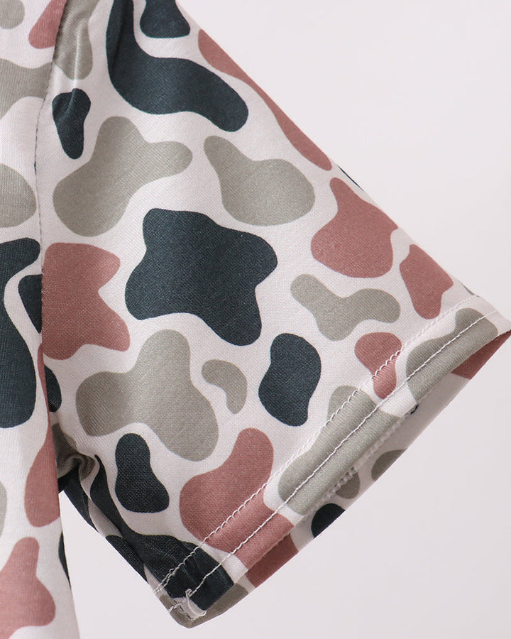 Camouflage-patterned fabric on a white background
