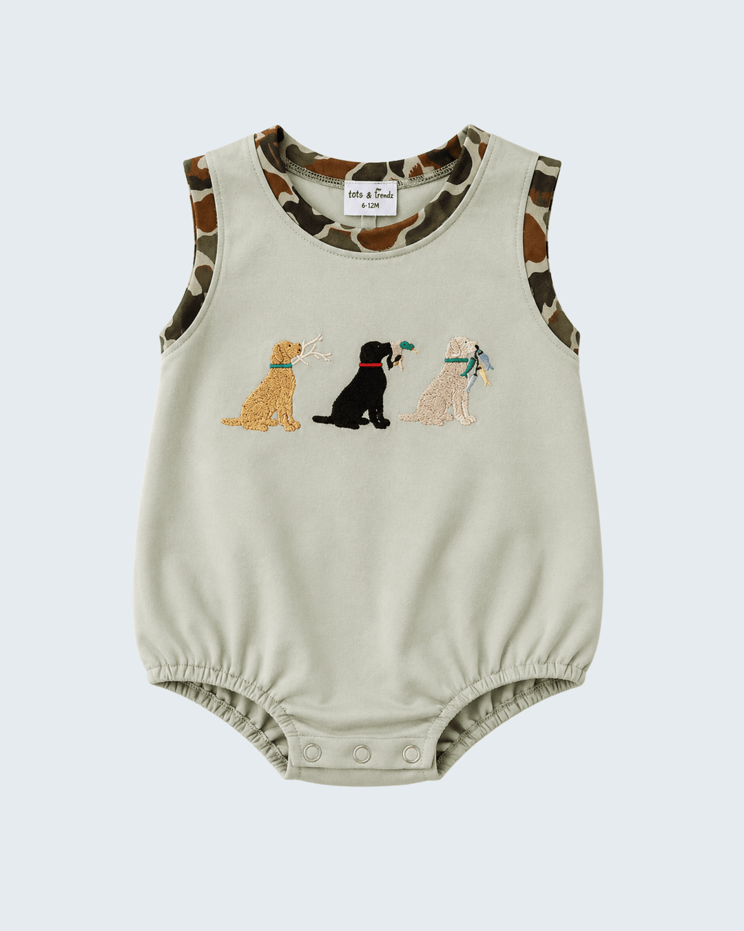 Baby romper with dog illustrations on a light gray background