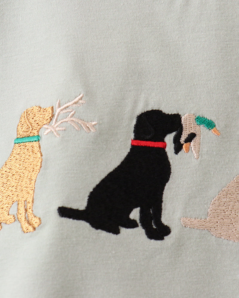 Embroidered dogs on a light gray background