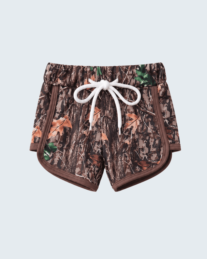 Camouflage shorts with a white drawstring on a light gray background