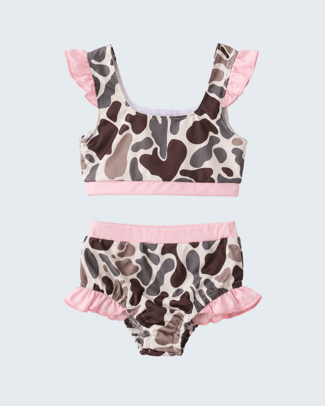Camouflage-patterned bikini set with pink accents on a light gray background