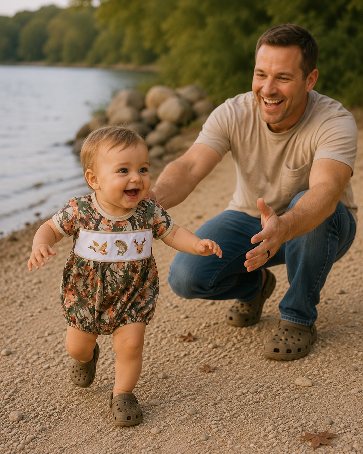 Baby is running from dad by the lake