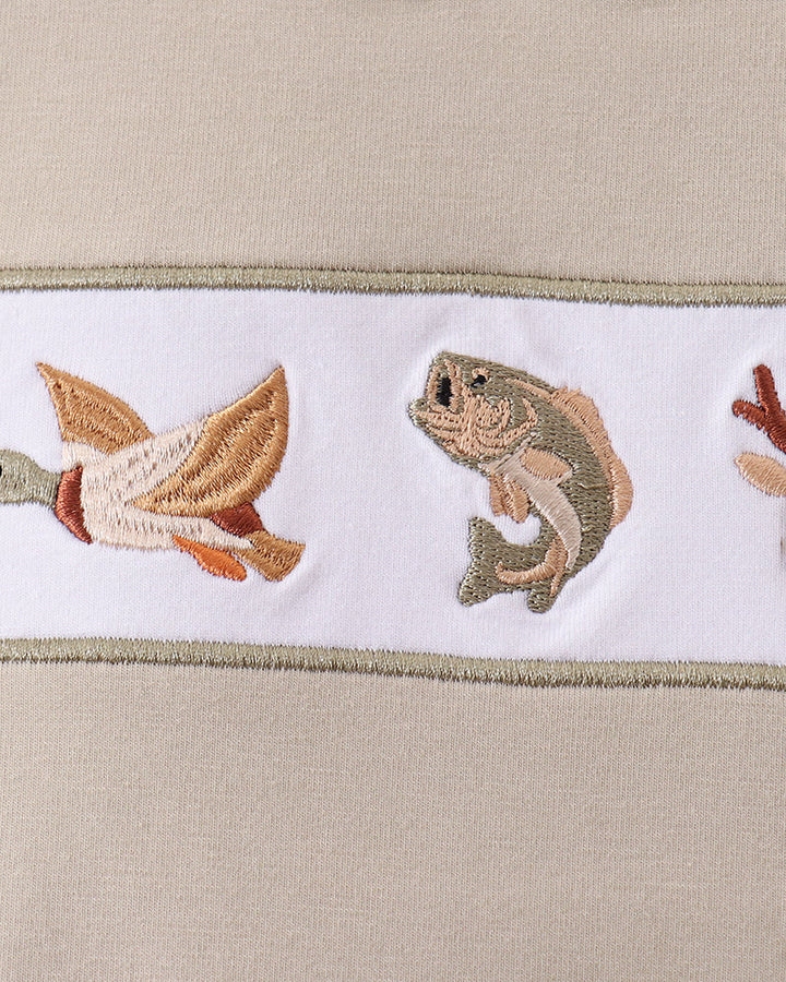 Duck and fish embroidery on beige shirt