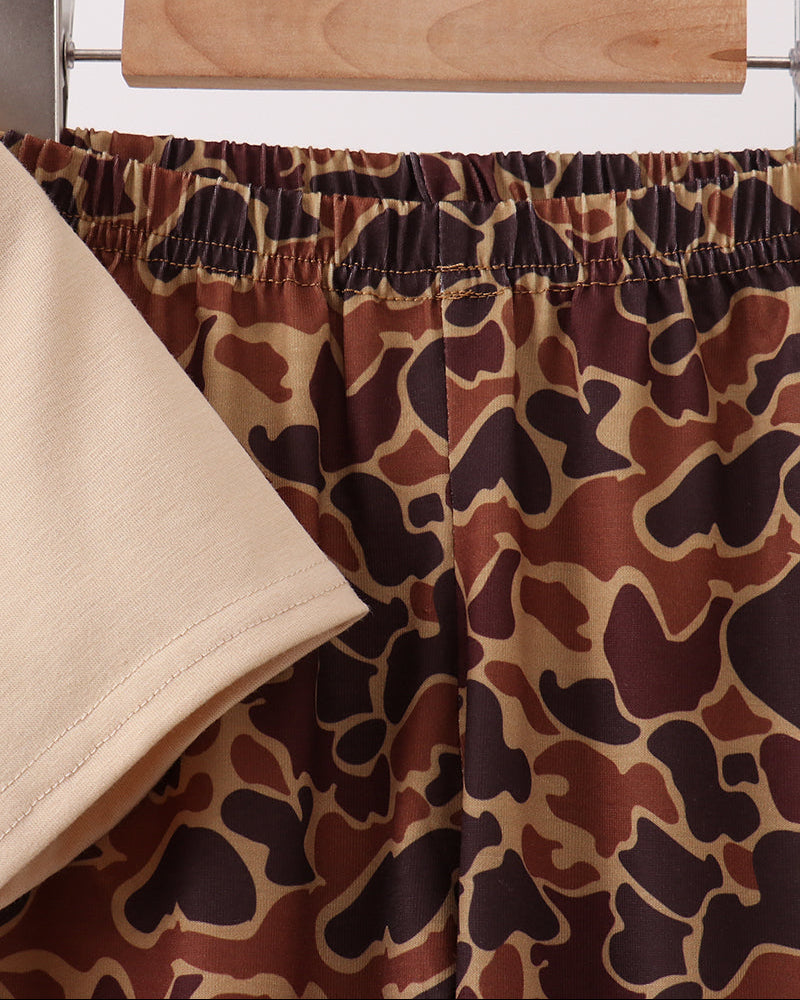 Camouflage pants with elastic waistband and brown-and-beige allover pattern
