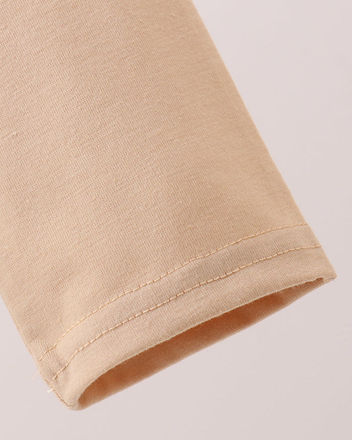 Beige long-sleeve top with sleeve hem and double-stitched edge