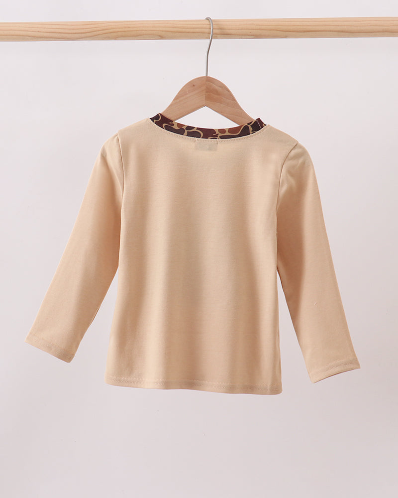 Beige long-sleeve top back with crew neck and smooth unprinted front panel