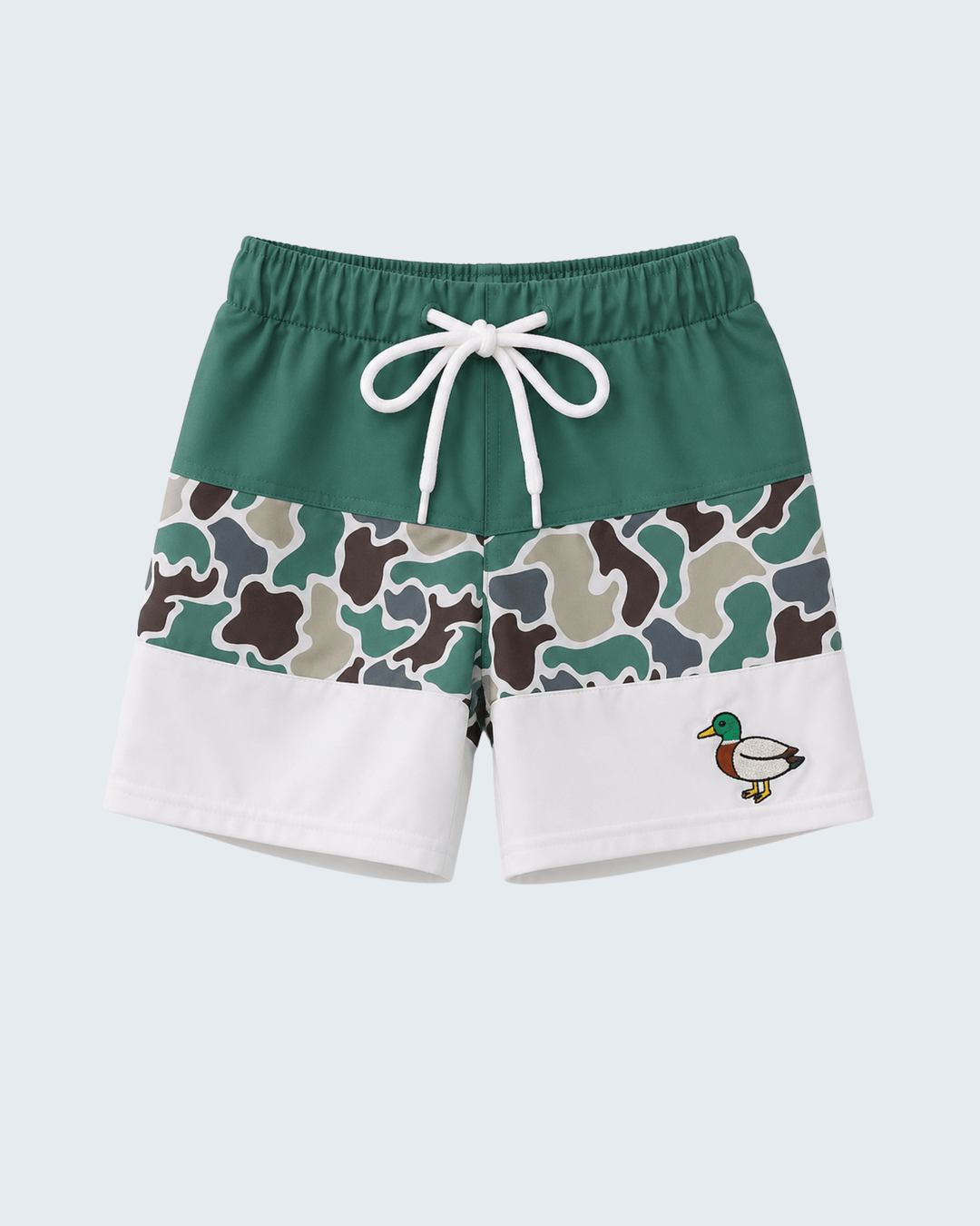 Green and white shorts with camouflage pattern and duck design on a light blue background