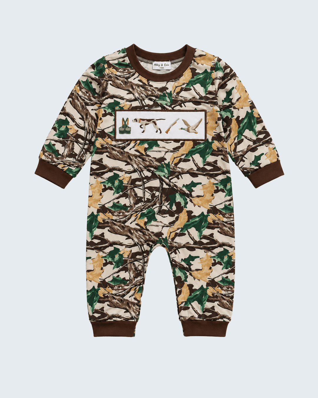 Camouflage romper with chest patch embroidery and long legs; crew neckline