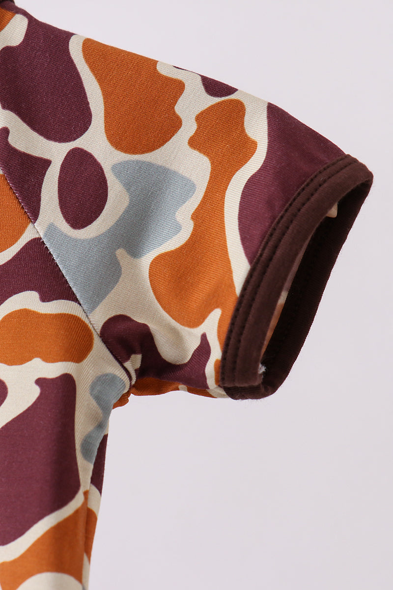 Close-up of a fabric with a colorful abstract pattern on a white background