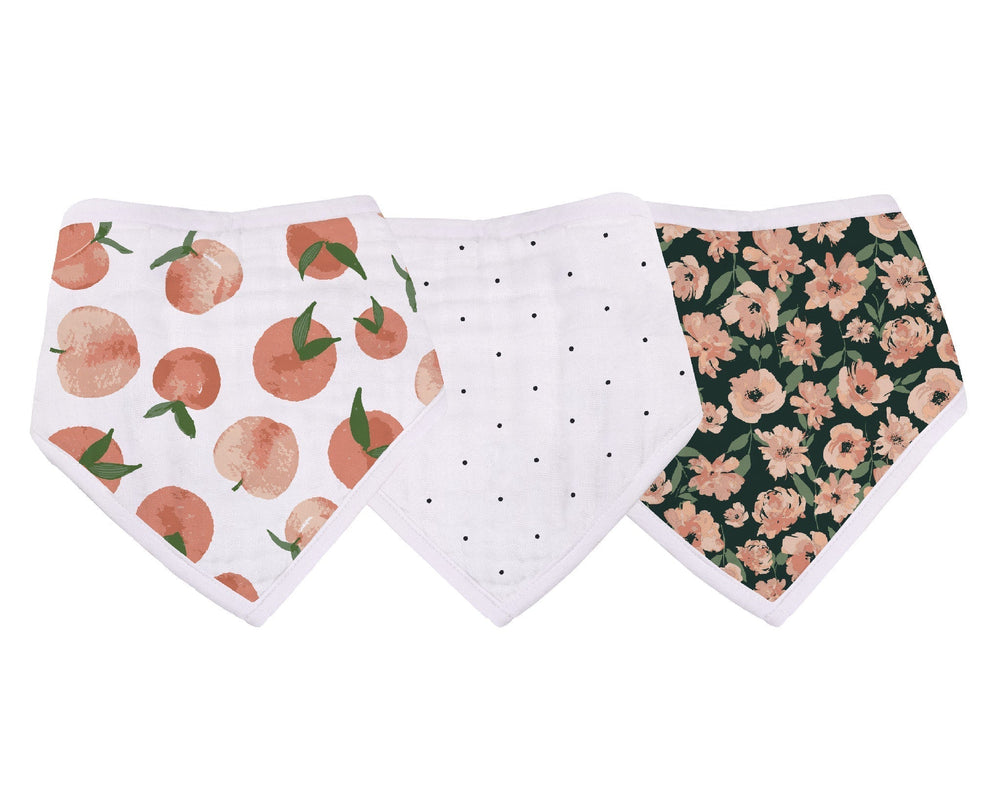 Three baby bibs with different patterns on a white background