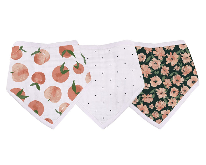 Three baby bibs with different patterns on a white background