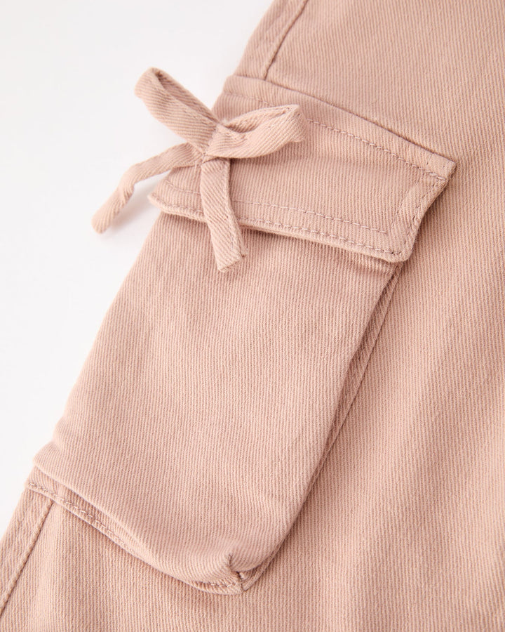 Light pink girls cargo pants side bow detail on flap pocket