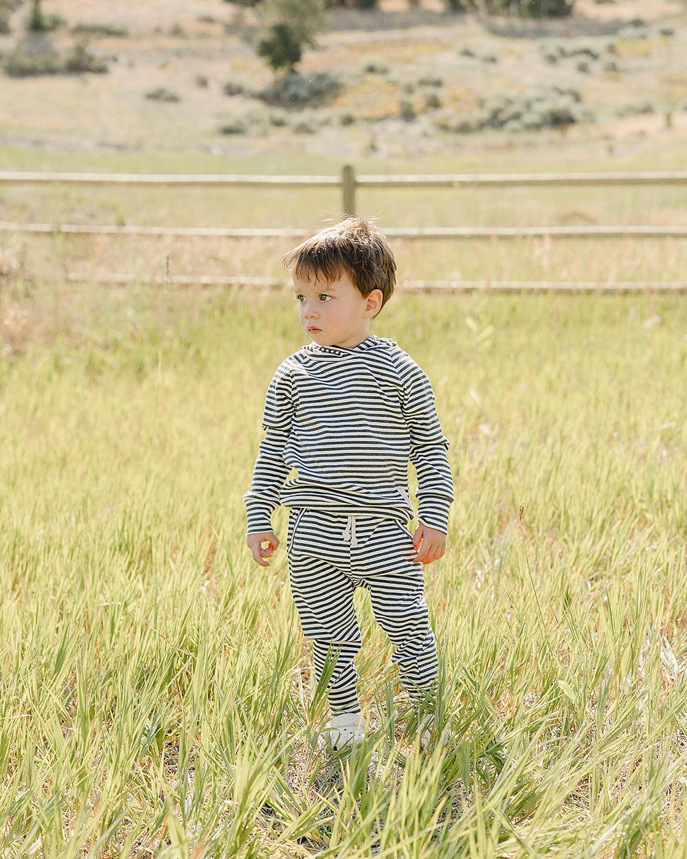 Charcoal ribbed hooded baby set with dark-and-white stripes; drawstring pants