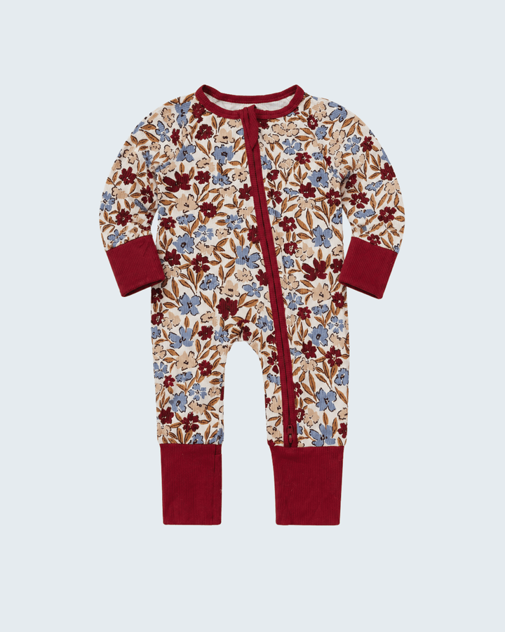 Floral ribbed bamboo romper with front zipper, long sleeves, brown and burgundy cuffs