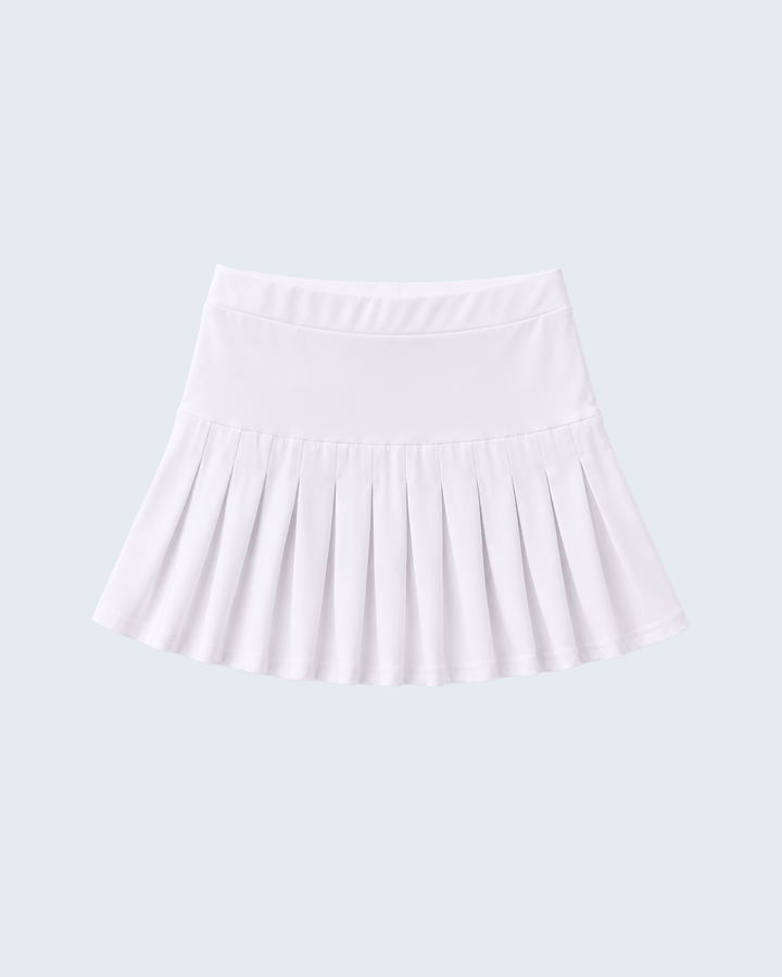 White pleated skort with wide elastic waistband and gathered ruffle hem