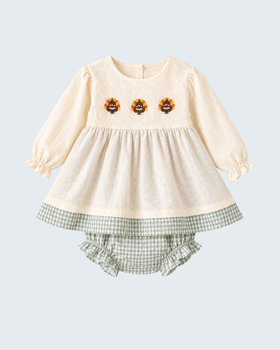 Cream dotted dress-style top with turkey embroidery and green gingham bloomer