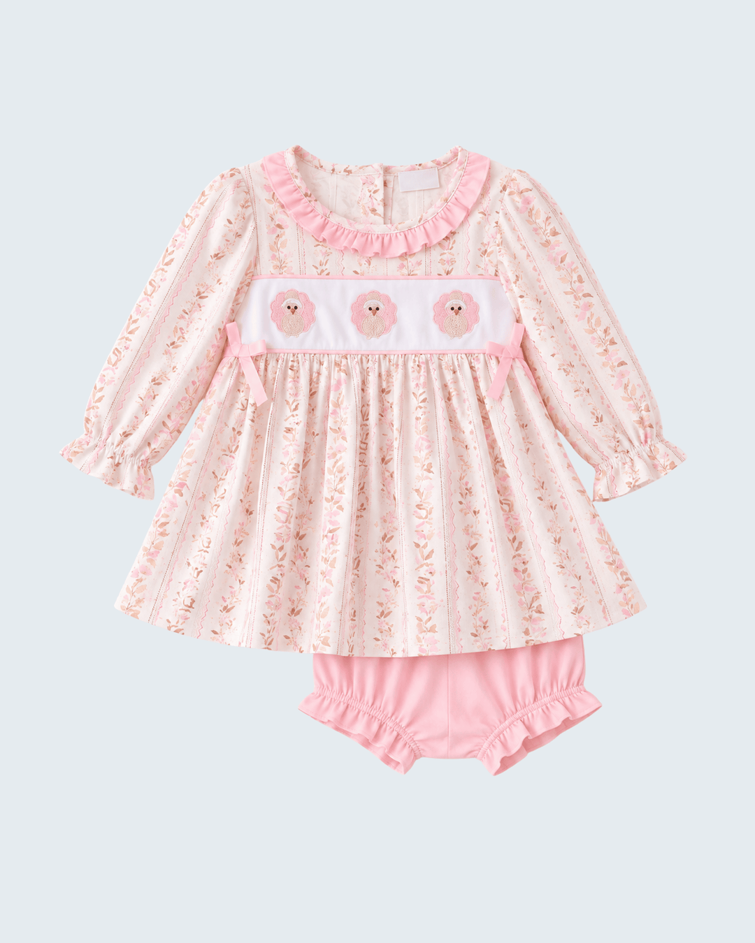 Pink floral long-sleeve dress with ruffle panel and matching pink bloomer shorts