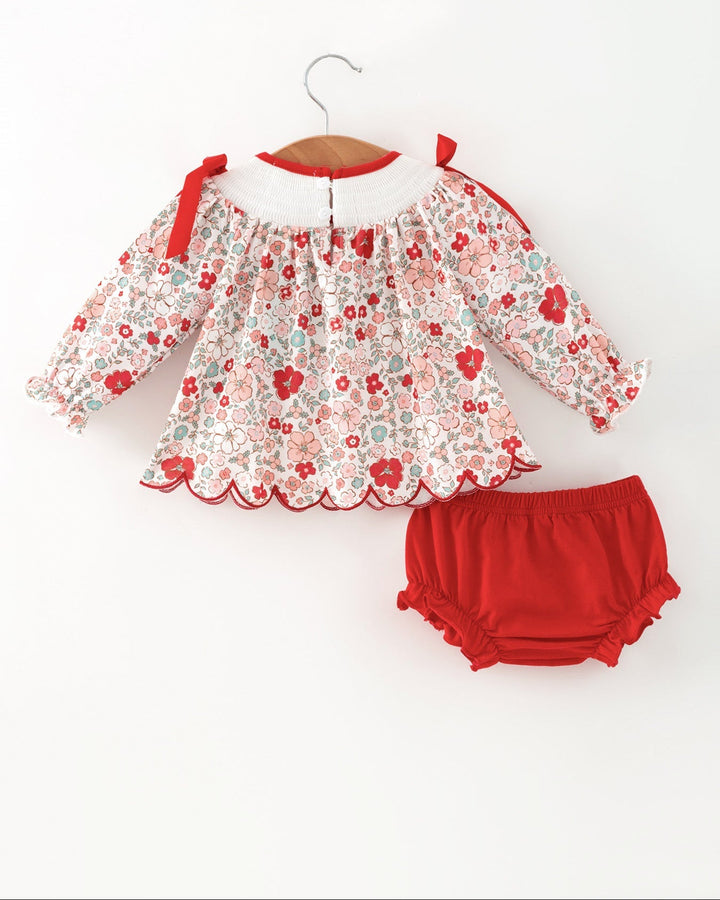 Floral baby girl outfit set with long sleeves, red bow shoulders, and red bloomers