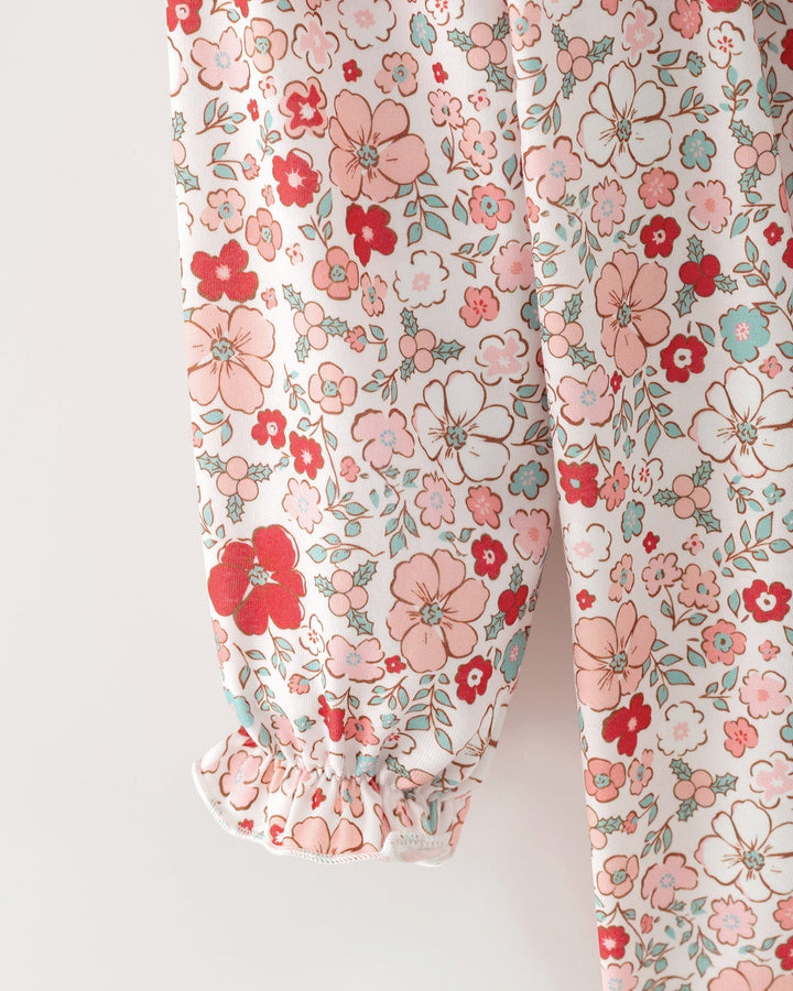 Girls floral dress close-up with elastic waist and gathered sleeve cuffs