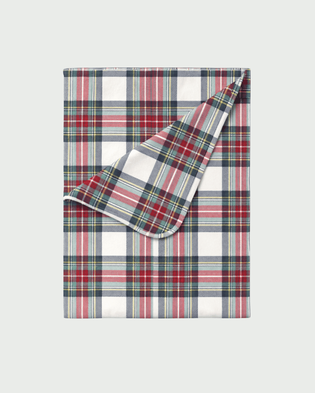 Bamboo baby blanket with classic red, green, and navy plaid pattern, folded