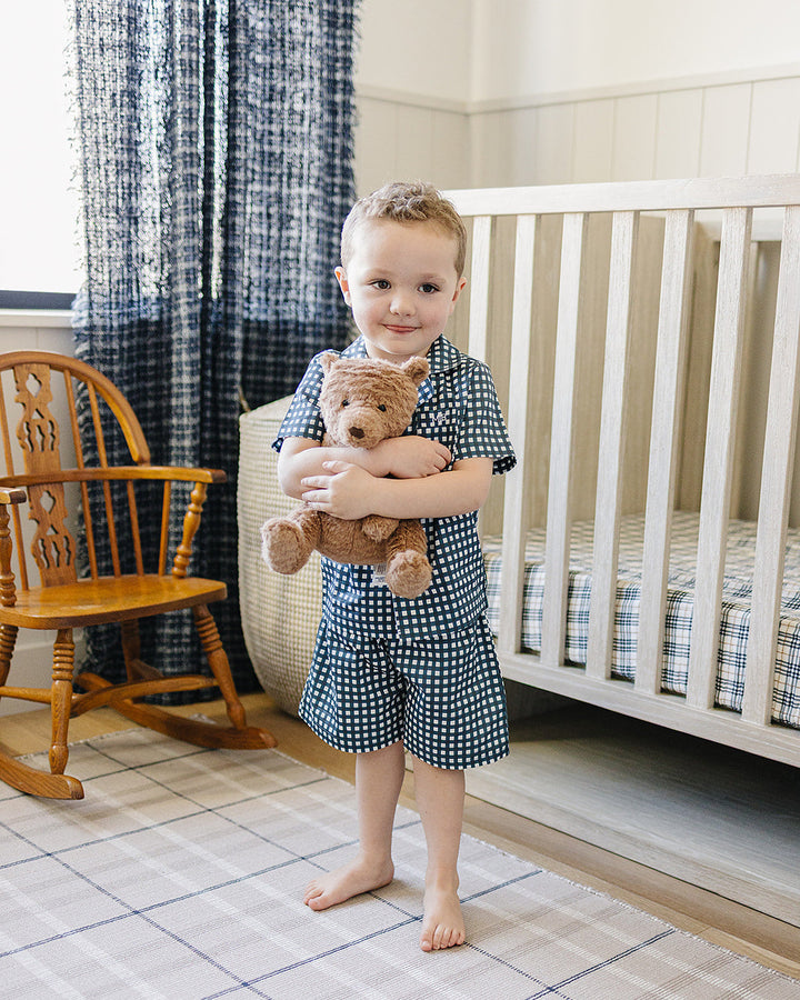 Blue gingham short pajama set: button-front shirt and matching shorts on child