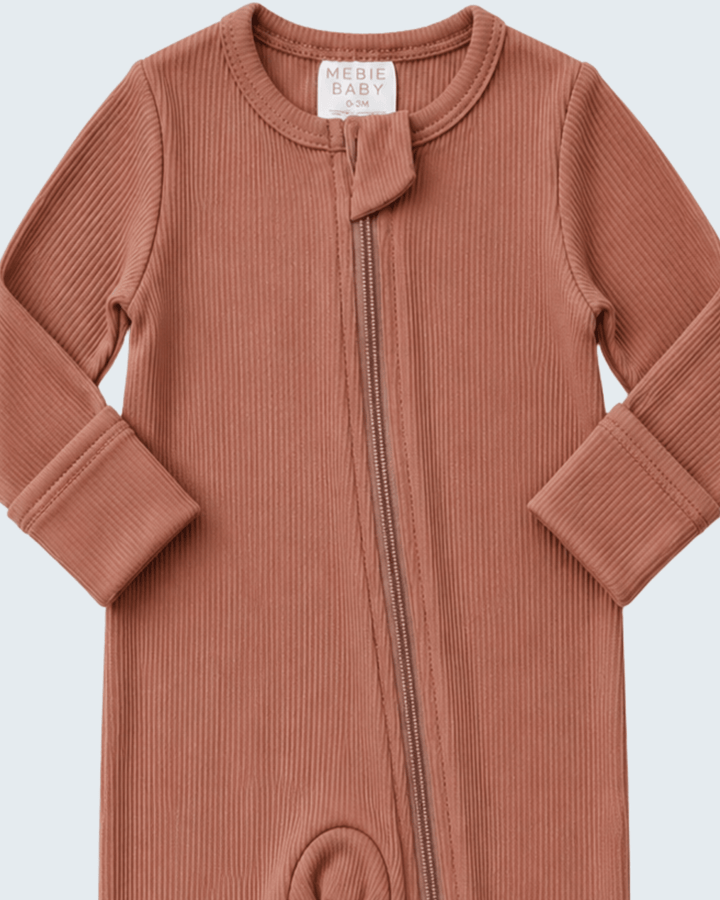 Dusty rose ribbed zip-front romper, long sleeves, with front zip and foldover collar