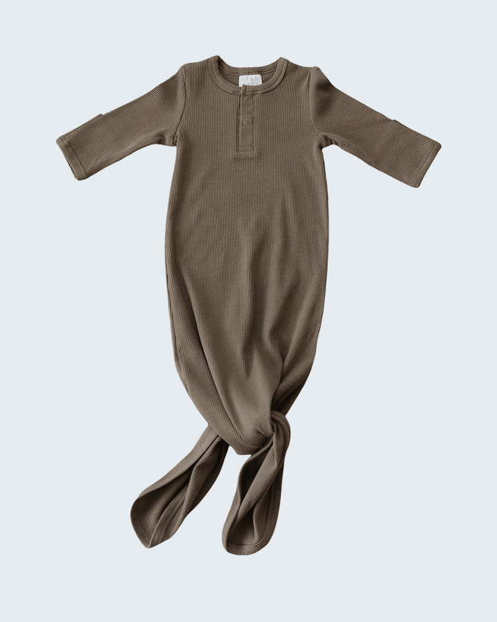 Brown ribbed cotton baby gown with long sleeves, henley placket, knotted front hem