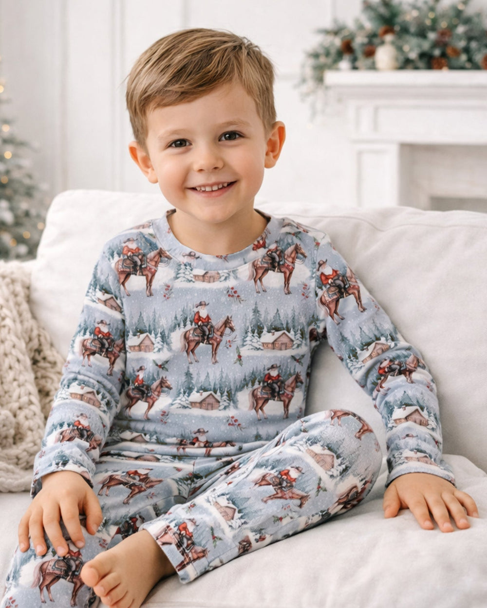 Kids bamboo pajama set with light blue western cowboy print and long sleeves