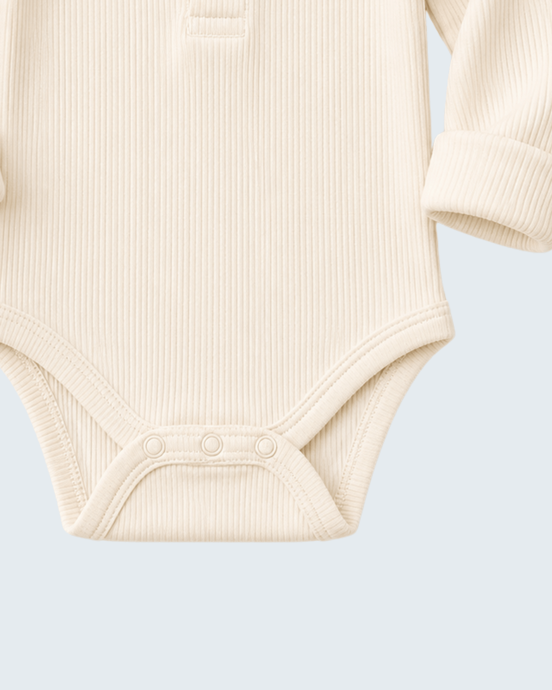 Cream baby bodysuit with snap closure