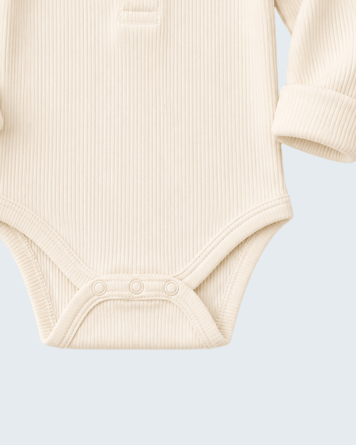 Cream baby bodysuit with snap closure